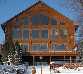 Executive Lake Home Located at 13725 Norelius Lane, Lindstrom, MN is available for sale by owner.